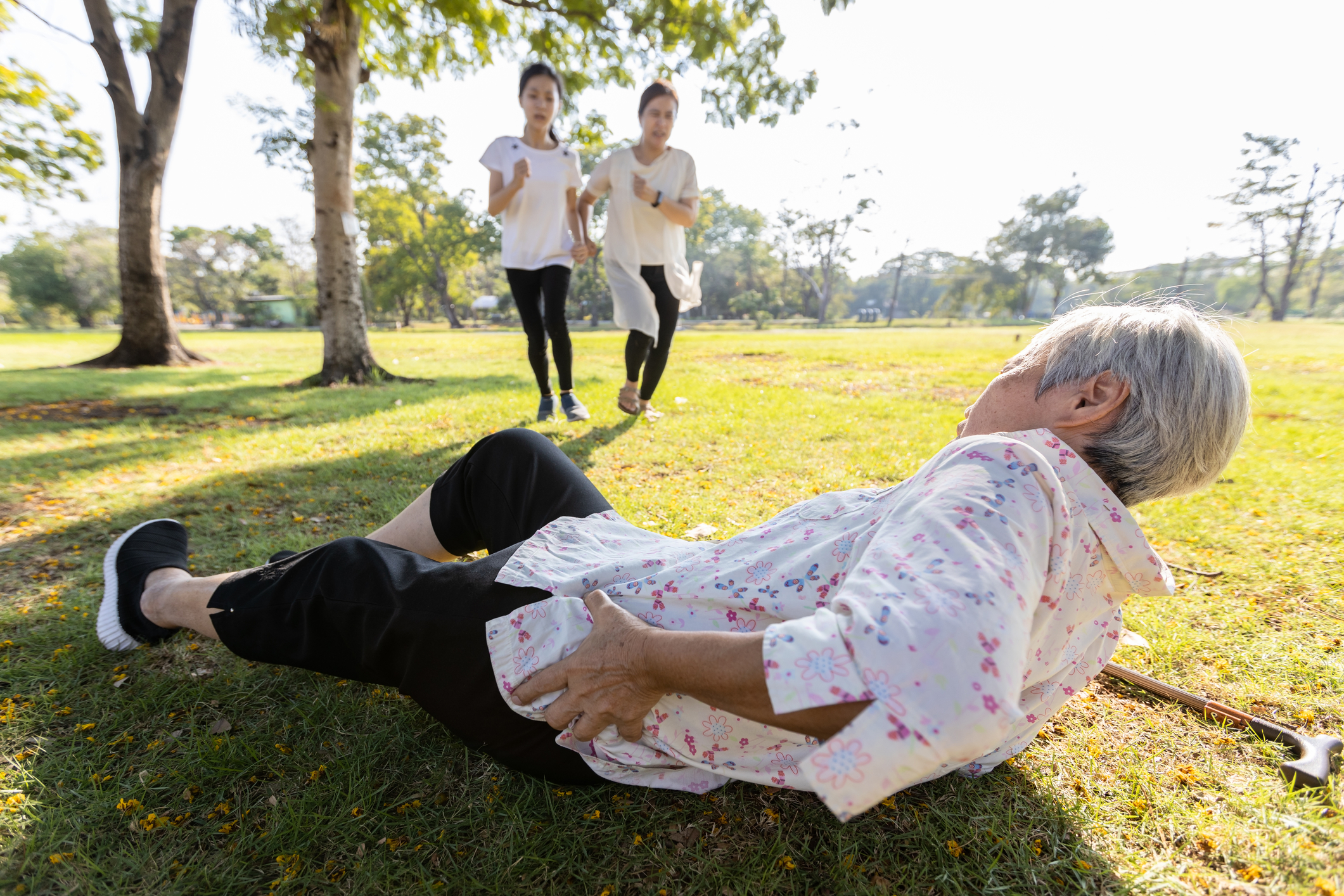 Fallen elderly woman with hip pain