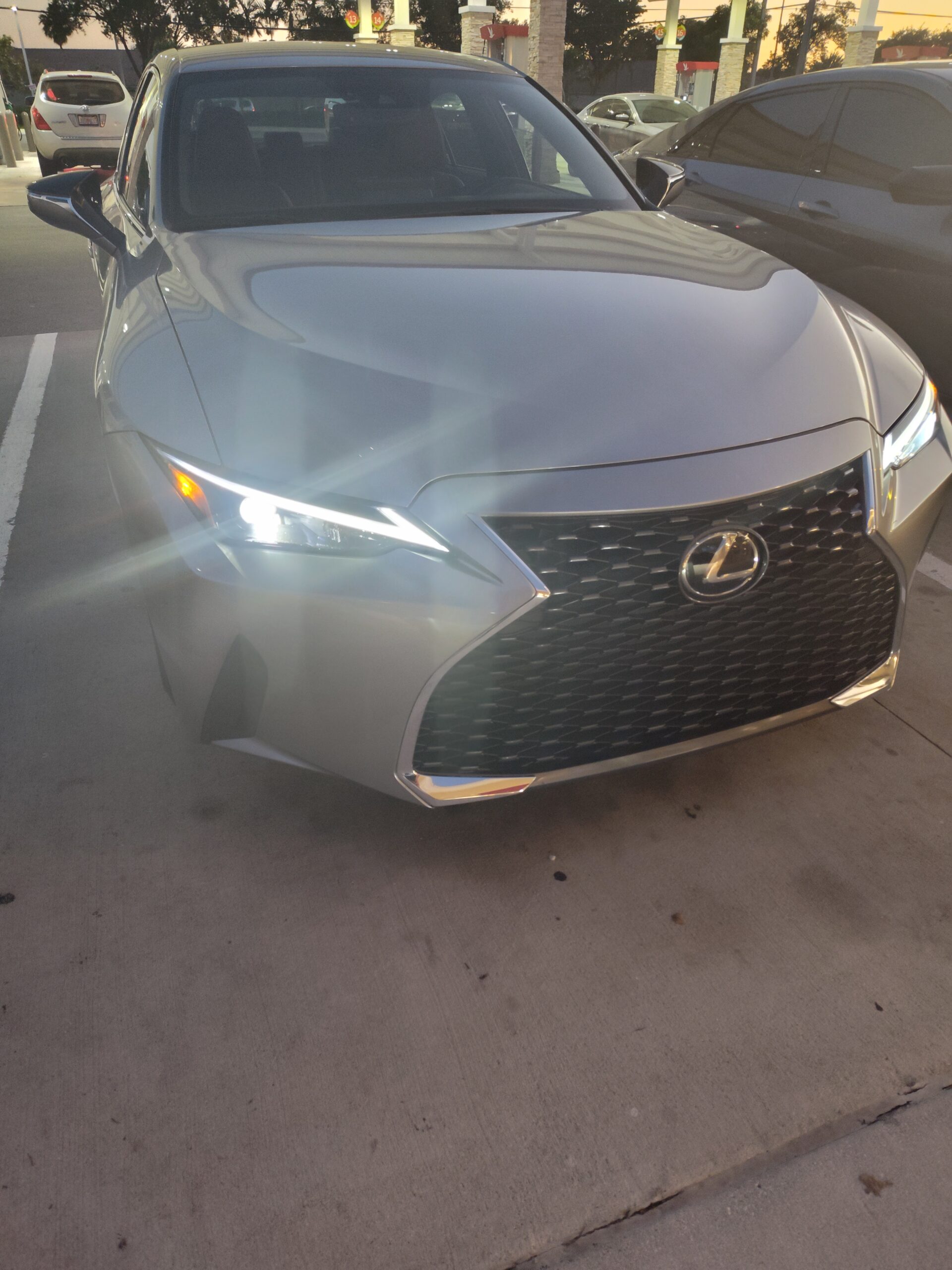 2021 Lexus IS300 Atomic Silver razor lights on